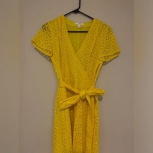 Bright yellow spring cotton dress with bow.